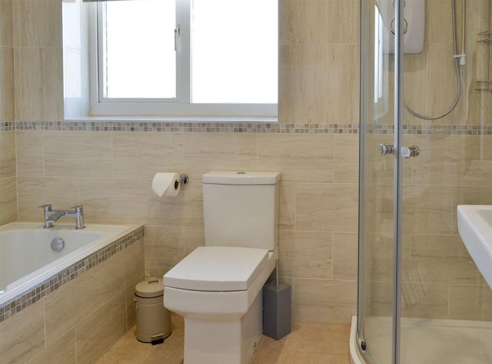 Family bathroom with bath and separate shower cubicle at No.19 in Filey, Yorkshire, North Yorkshire