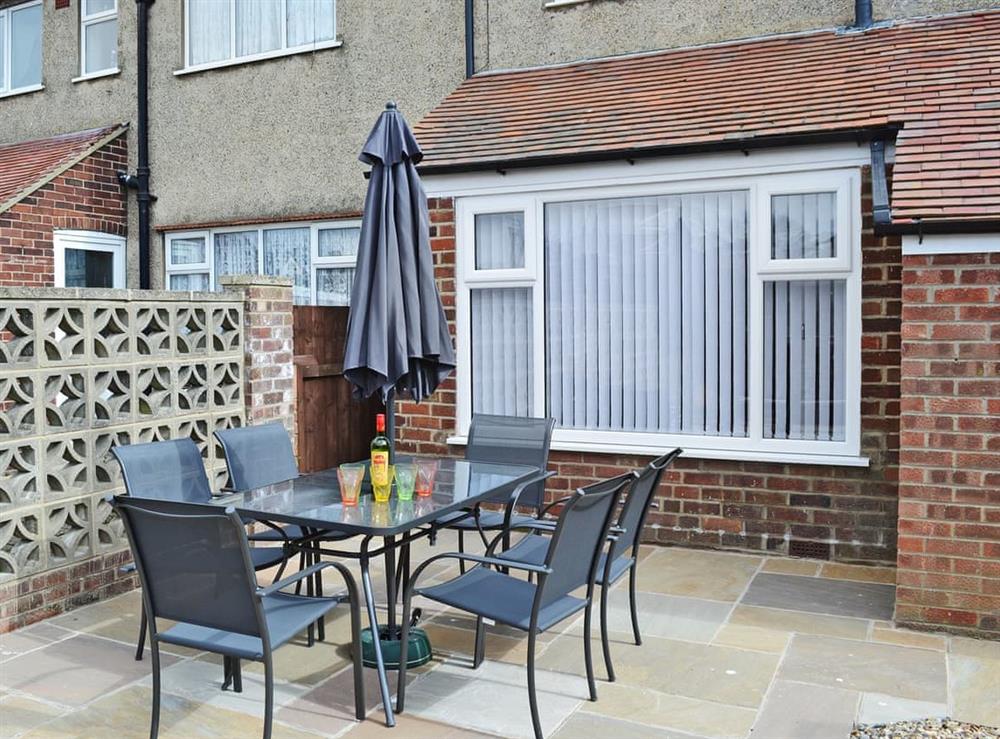 Spacious patio area with garden furniture at No.19 in Filey, Yorkshire, North Yorkshire