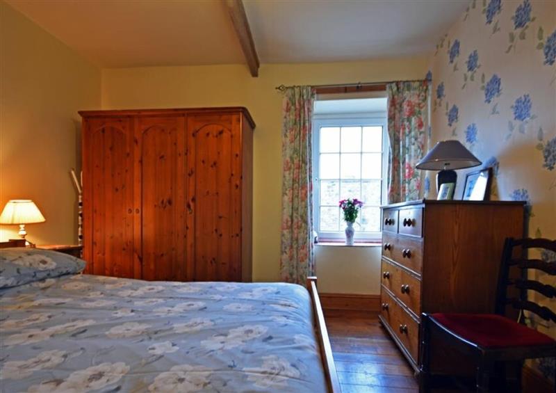 A bedroom in No2 Budle Bay Cottage at No2 Budle Bay Cottage, Bamburgh