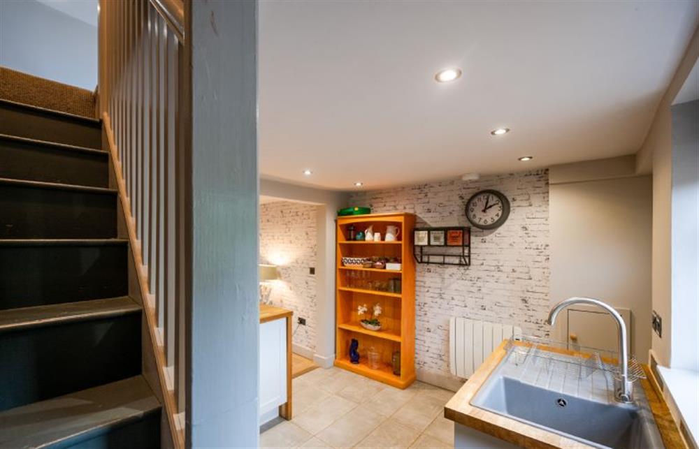 Ground floor: Kitchen and stairs to first floor at No.33 Cottage 1, Thornham near Hunstanton