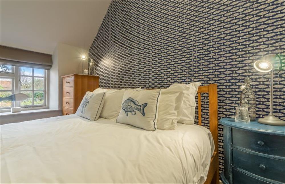 First floor: Bedroom two, king-size bed at No.33 Cottage 4, Thornham near Hunstanton