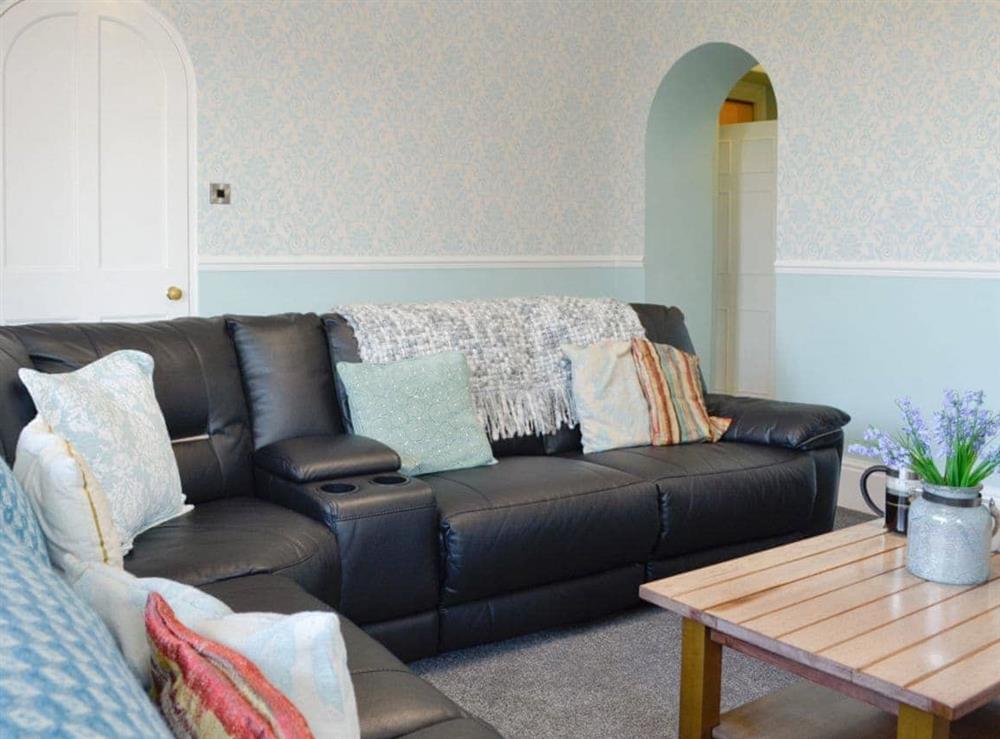 Comfy seating within living room at Noddfa in Harlech, Gwynedd., Great Britain