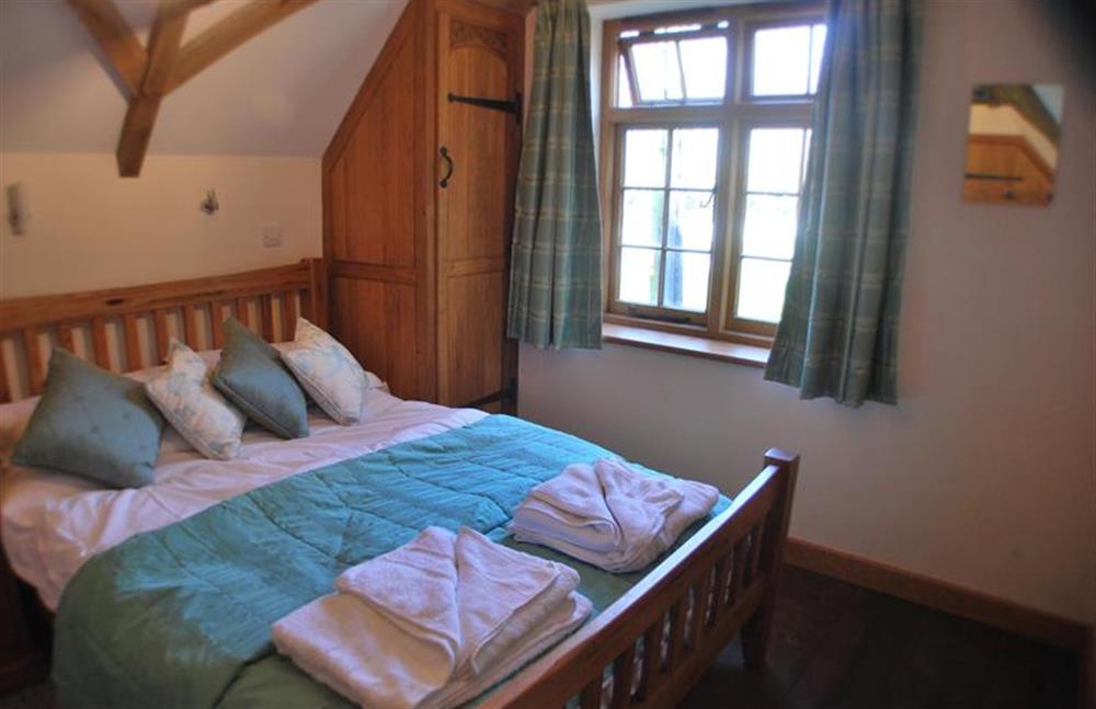 First floor:  Second double bedroom with vaulted beamed ceiling at Nooky House, Cley-next-the-Sea near Holt