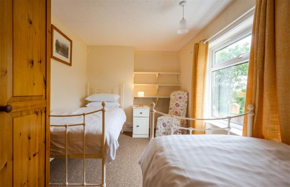 First floor: Bedroom three with twin 3ft single beds at Norahs Cottage, Potter Heigham near Great Yarmouth