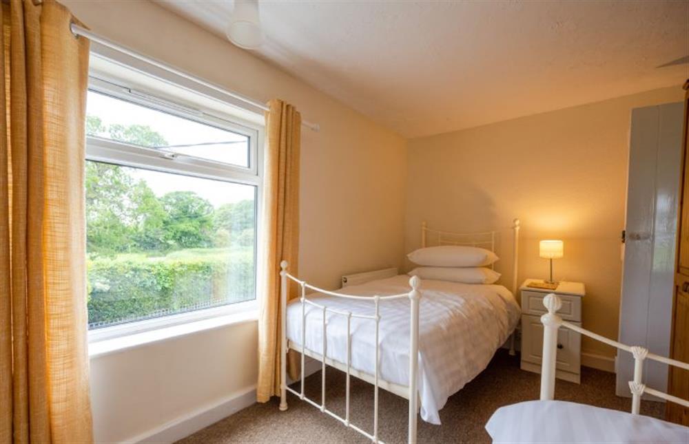 First floor: Bedroom three at Norahs Cottage, Potter Heigham near Great Yarmouth