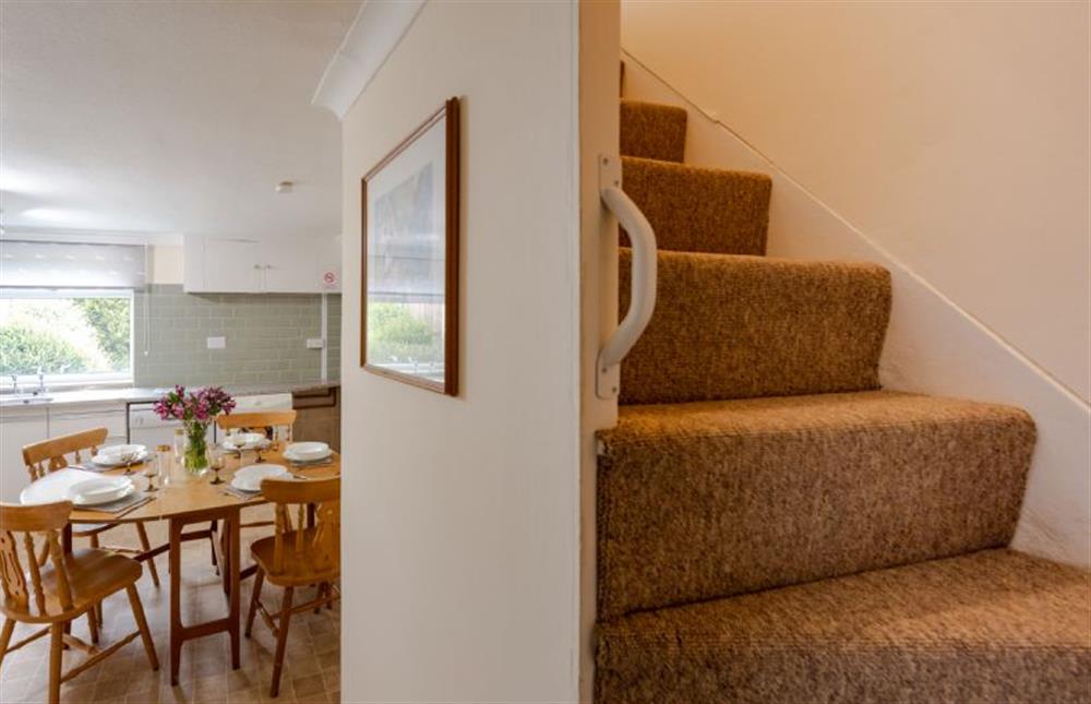 Ground floor: Stairs to the first floor, accessed via a steep Norfolk winder staircase at Norahs Cottage, Potter Heigham near Great Yarmouth