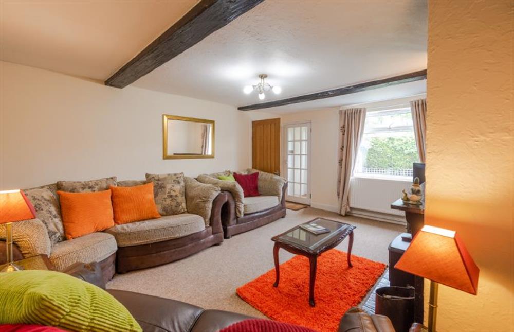 Norahfts Cottage: Sitting room with Smart television and electric living flame fire at Norahs Cottage, Potter Heigham near Great Yarmouth
