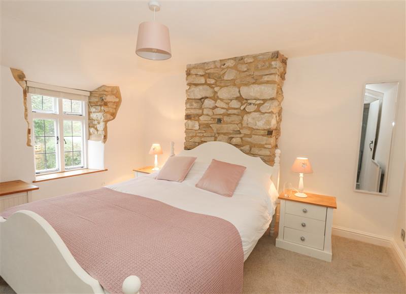 One of the 3 bedrooms at Norden Cottage, Osmington