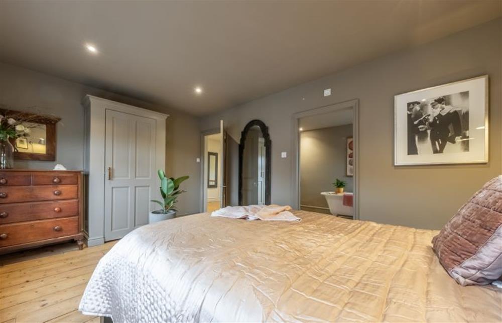 First floor: Master bedroom at Norfolk House, Heacham near Kings Lynn