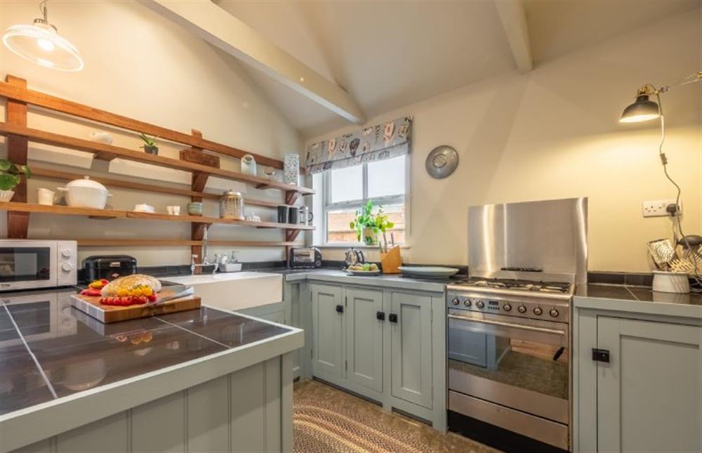 Ground floor: Well-equipped kitchen at Norfolk House, Heacham near Kings Lynn