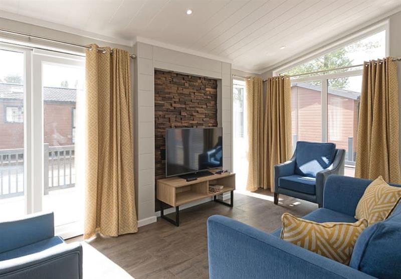 The living room in an Oxburgh at Norfolk Woods Resort & Spa in Pentney, King’s Lynn