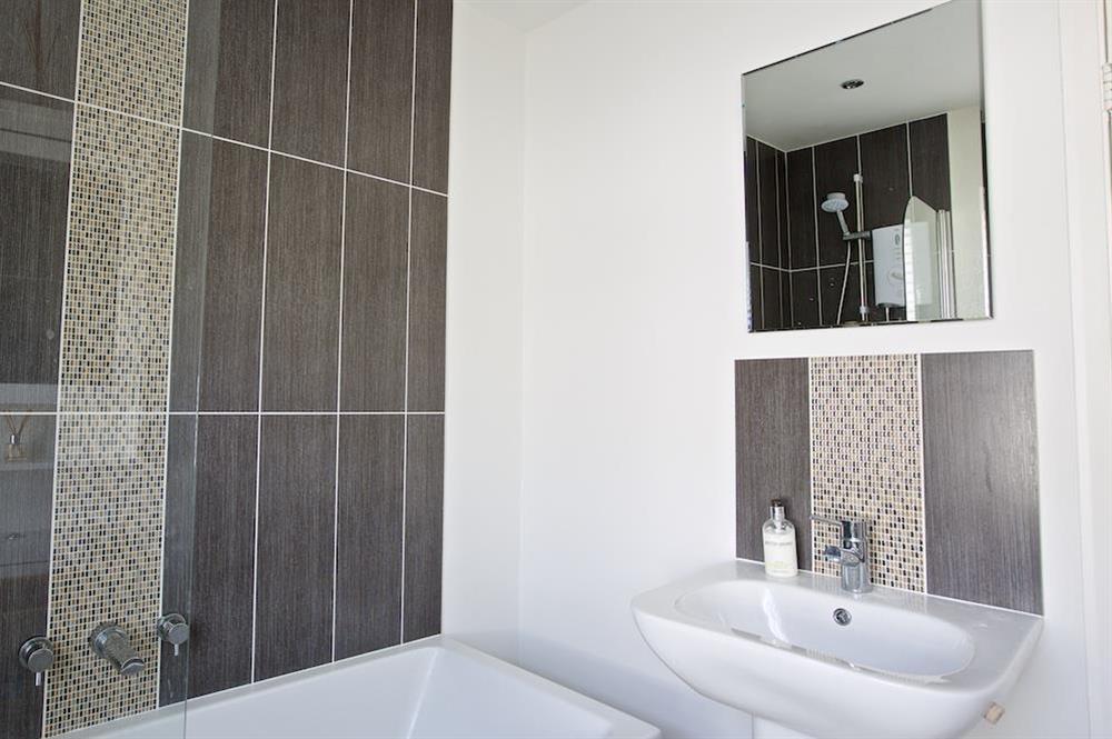 Family bathroom with shower over bath at Normandy Watch in , Salcombe