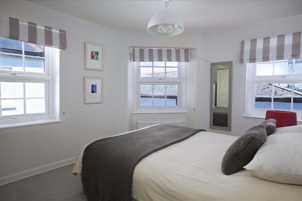 Master bedroom with views over the town and towards the harbour at Normandy Watch in , Salcombe