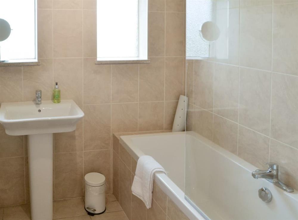 Family bathroom with shower over bath at North Farm Bungalow in Horsley, near Newcastle-upon-Tyne, Northumberland