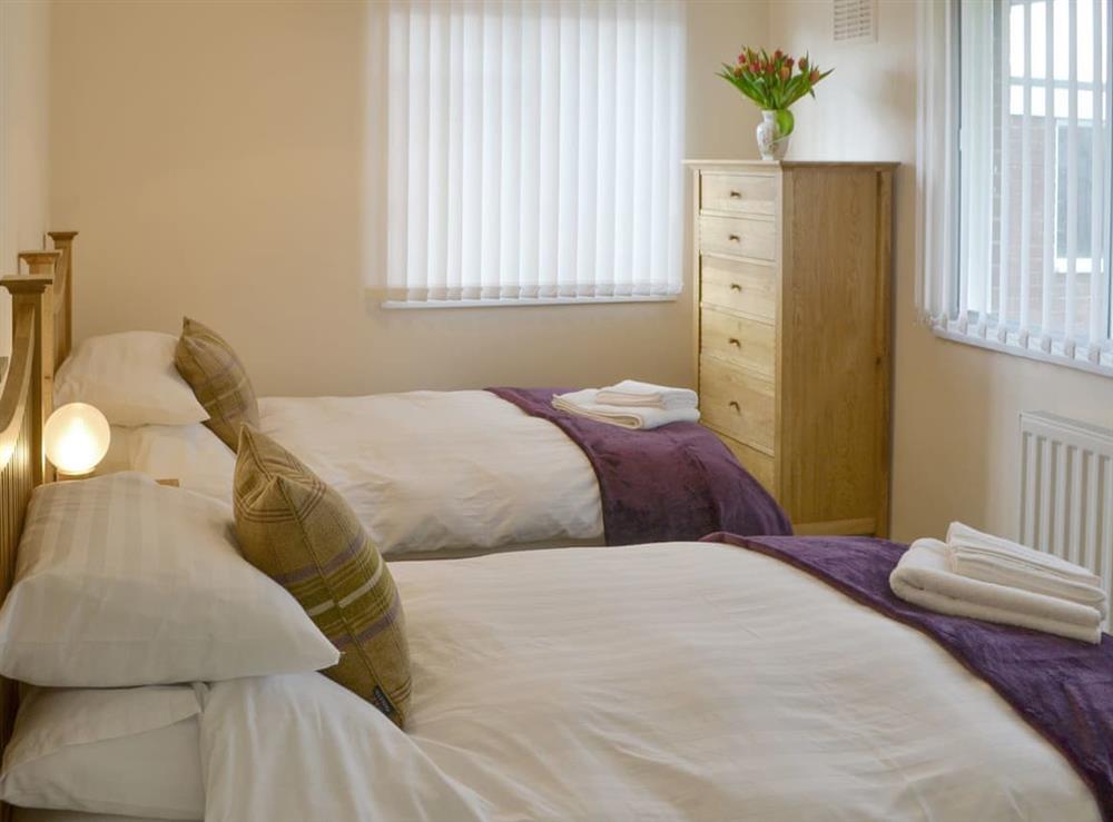 Good-sized twin bedroom at North Farm Bungalow in Horsley, near Newcastle-upon-Tyne, Northumberland