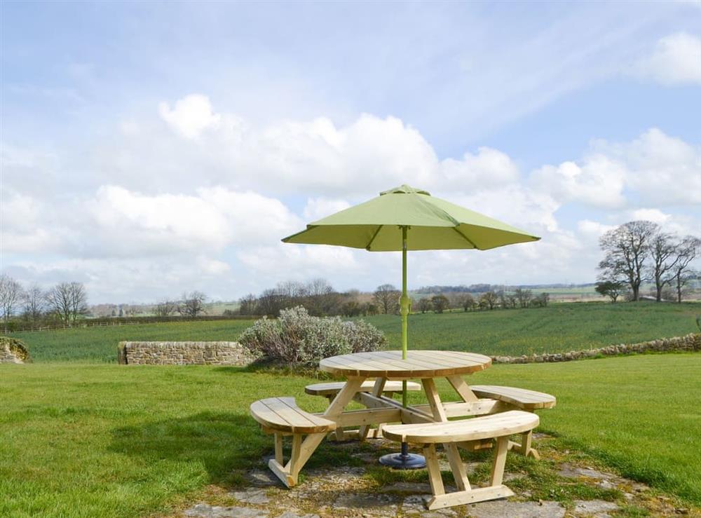 Patio area with outdoor furniture at North Farm Bungalow in Horsley, near Newcastle-upon-Tyne, Northumberland