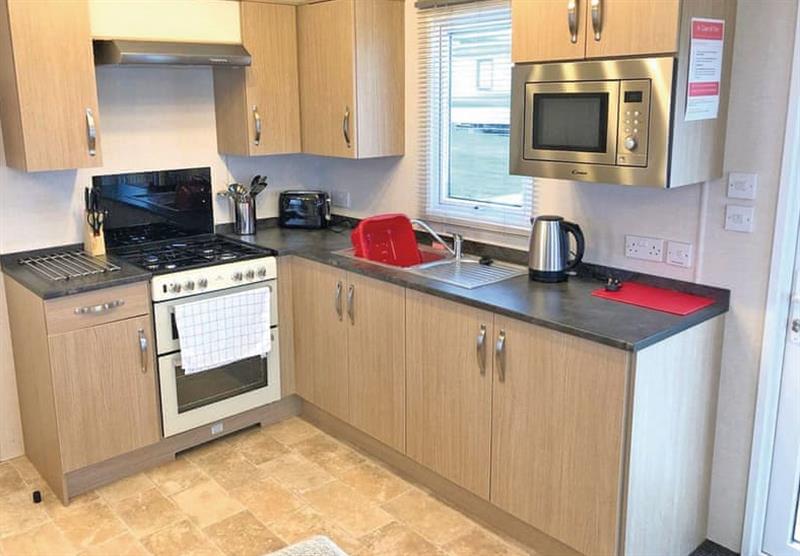 Kitchen in the Willow caravan at North Lakes Country Park in Silloth, Cumbria