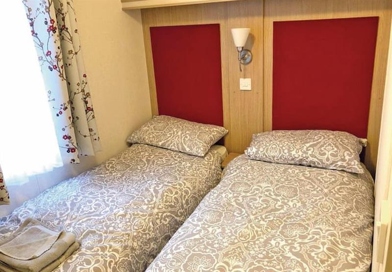 Twin beds in the Birch caravan at North Lakes Country Park in Silloth, Cumbria