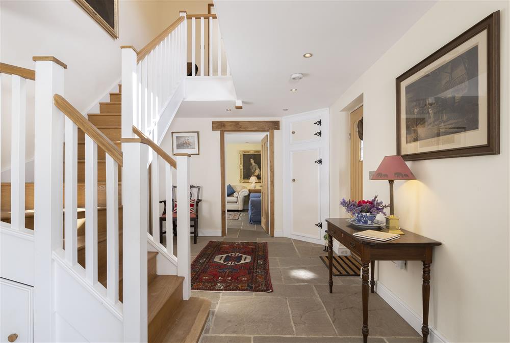 Beautiful entrance hall with stairs leading to the first floor  at North Leigh Barn, Crediton 
