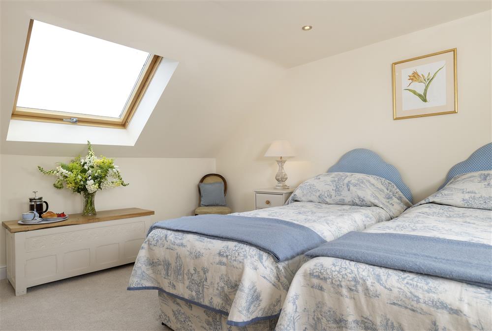 First floor: Bedroom two with twin 3ft single beds and en-suite shower room (photo 2) at North Leigh Barn, Crediton