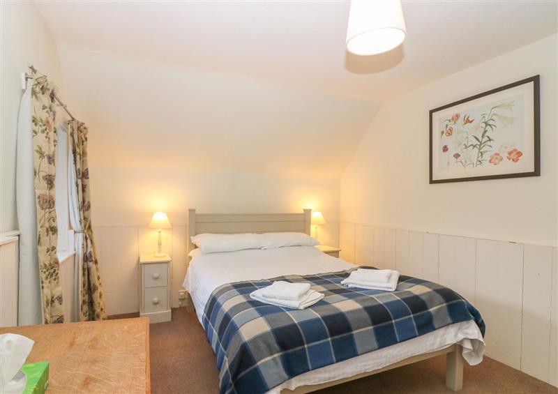 A bedroom in North Mains Cottage at North Mains Cottage, Craigievar near Alford