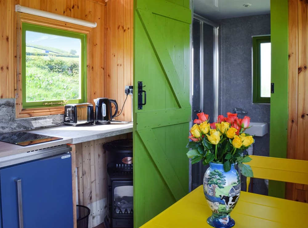 Kitchen/diner at North Moor Farm Shepherds Hut in Upper Heaton, Huddersfield, West Yorkshire