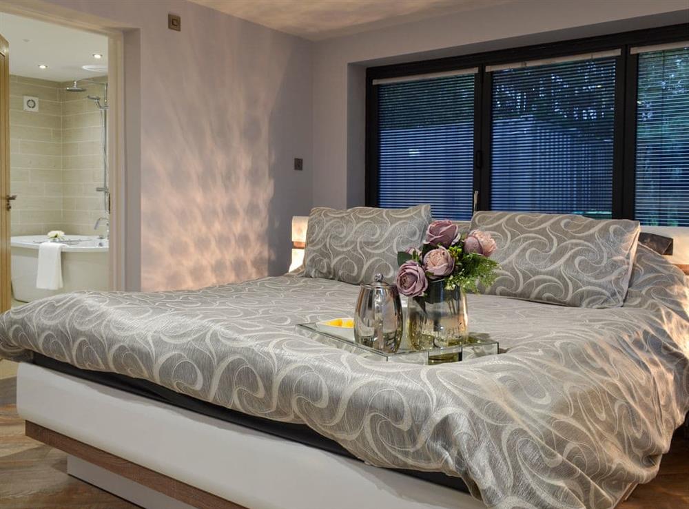 Attractive master bedroom with en-suite at North Plain Farm in Bowness on Solway, Cumbria