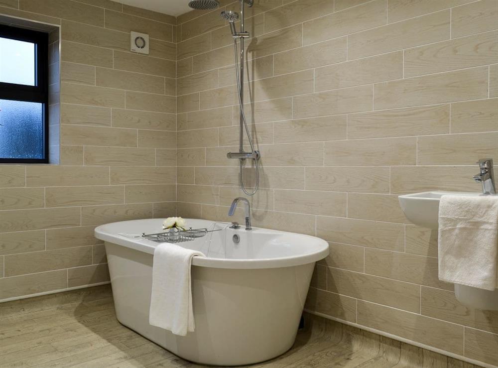 Relaxing en-suite bathroom at North Plain Farm in Bowness on Solway, Cumbria