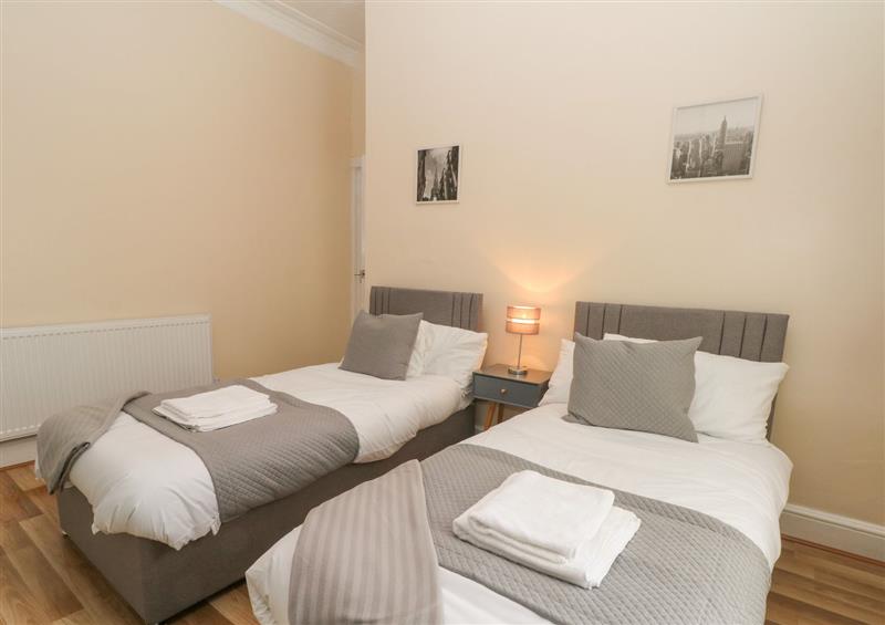 One of the bedrooms at North Shore Apartment, Blackpool
