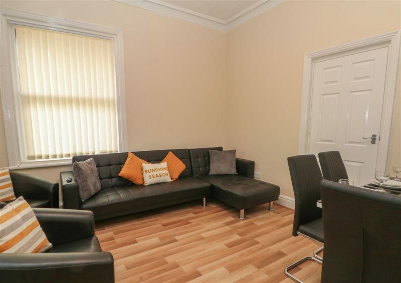 Relax in the living area at North Shore Apartment, Blackpool