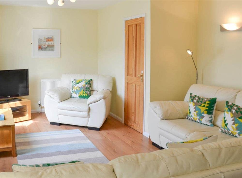 Bright sunny living room at North Shore in Crantock, N. Cornwall., Great Britain
