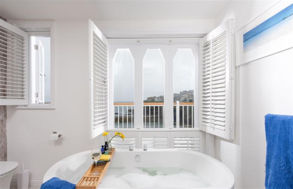 Family bathroom with free-standing bath and sea views at Northcliffe, Port Isaac