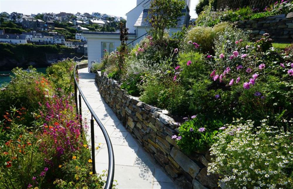 Paths with railings throughout the terraced garden at Northcliffe, Port Isaac