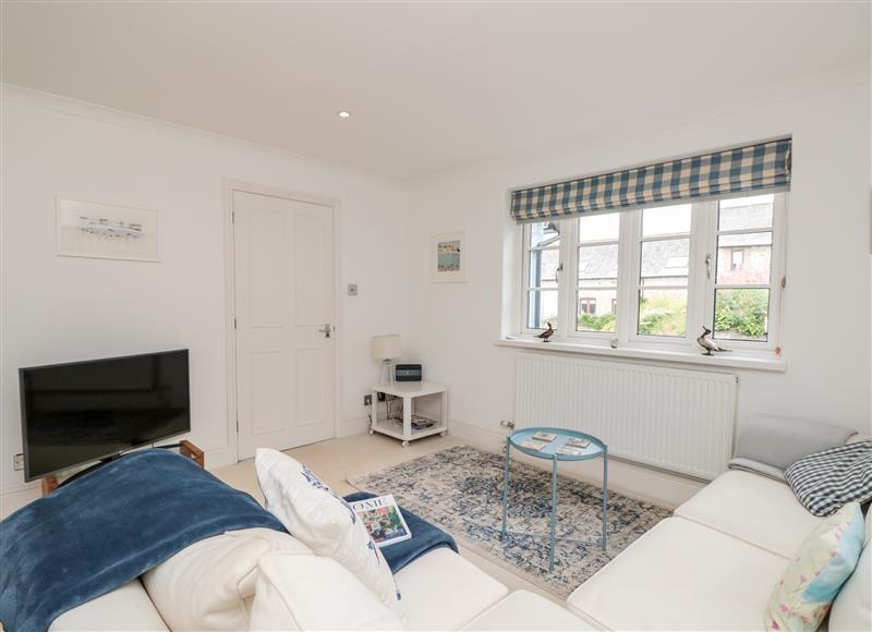 Relax in the living area at November Cottage, Dittisham
