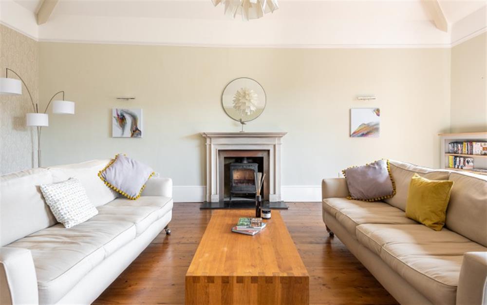 Bright and spacious sitting room with door leading to front south facing terrace. at Number 1, Thurlestone Court in Dartmouth