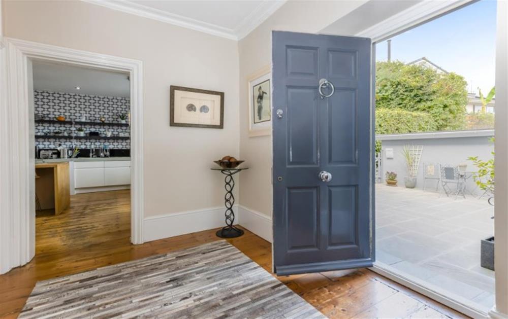 Entrance hallway with door leading through to kitchen/diner and front door to large courtyard patio. at Number 1, Thurlestone Court in Dartmouth