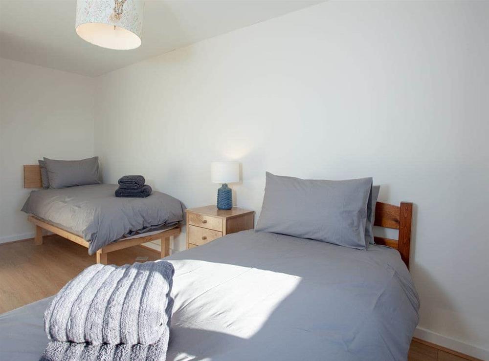 Twin bedroom at Number 11 in Mawgan Porth, Cornwall