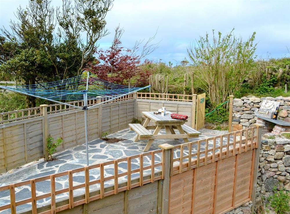 Large enclosed tiered garden with patio at Number 19 in Trewellard, near St Just, Cornwall