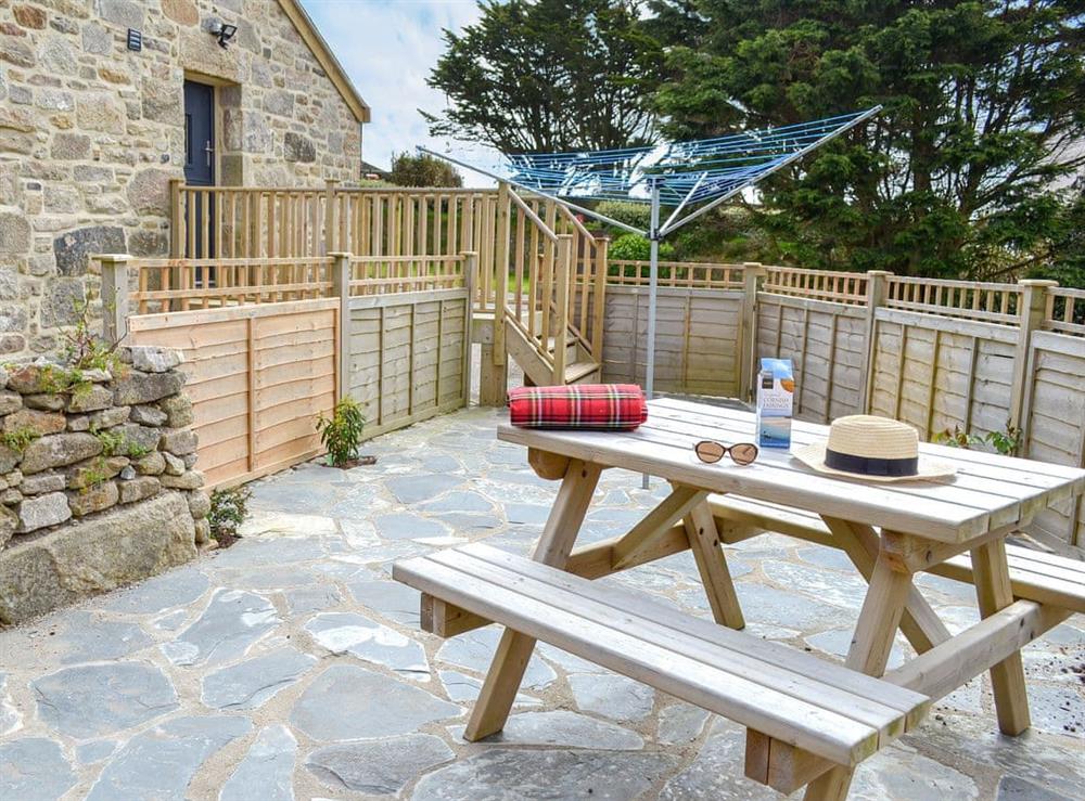 Outdoor area with garden furniture at Number 19 in Trewellard, near St Just, Cornwall