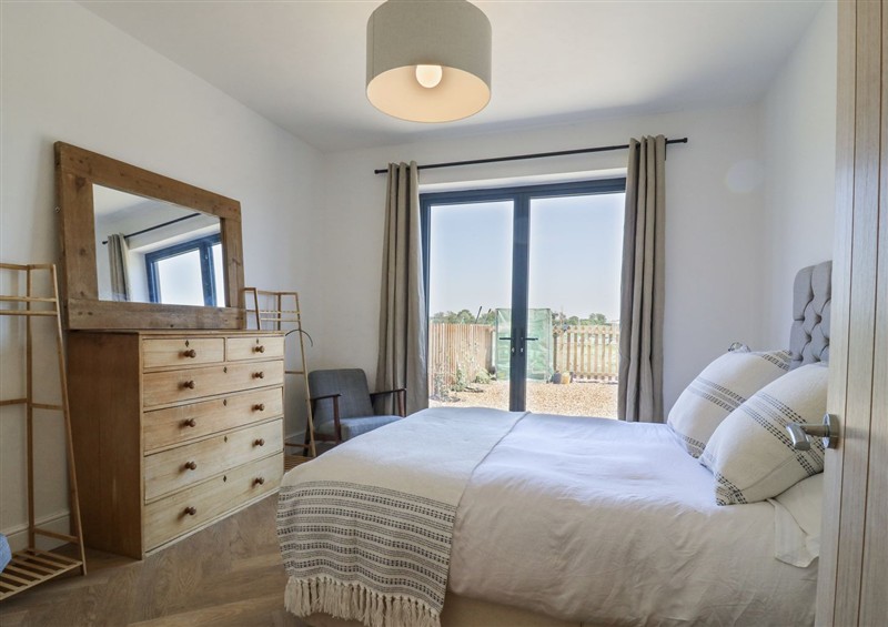 One of the bedrooms at Number 2 The Barn House, Woodham