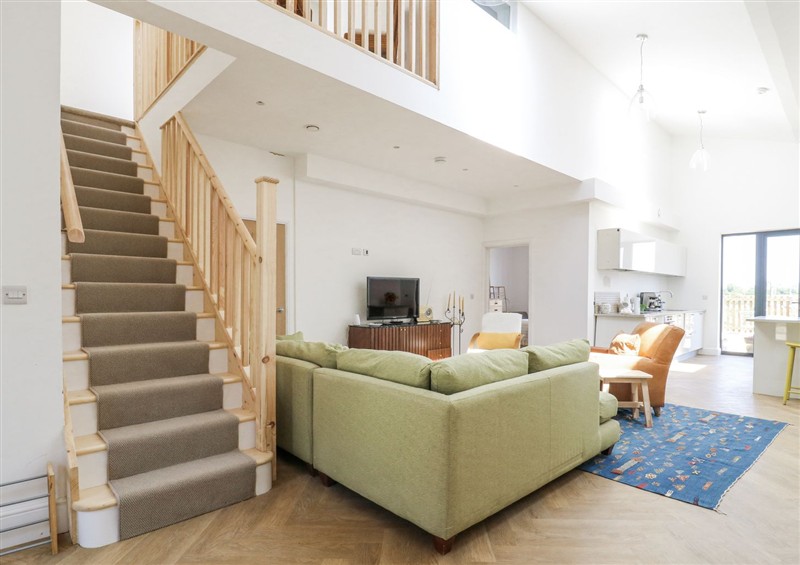 Relax in the living area at Number 2 The Barn House, Woodham