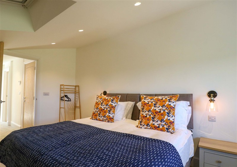 One of the bedrooms at Number 3 The Barn House, Woodham