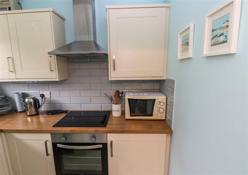 This is the kitchen at Number 6 Oxwich Leisure Park, Oxwich