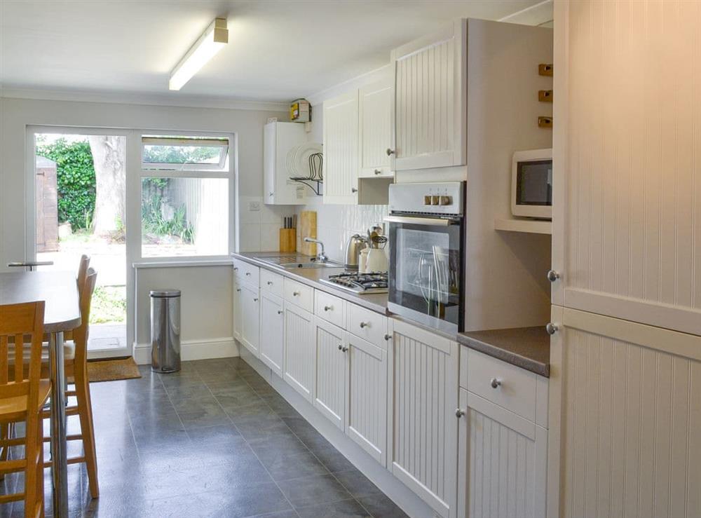 Well-appointed fitted kitchen with dining area at Number Five in St Minver, near Rock, Cornwall