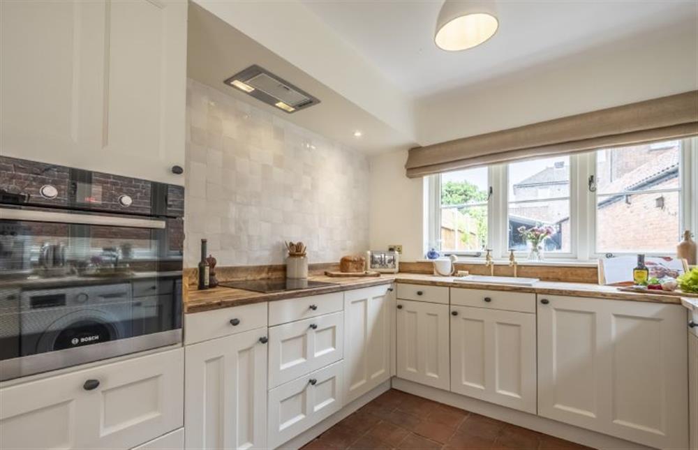Kitchen with electric oven and induction hob, dishwasher, fridge/ freezer and washer/ dryer at Number Four, Overstrand near Cromer