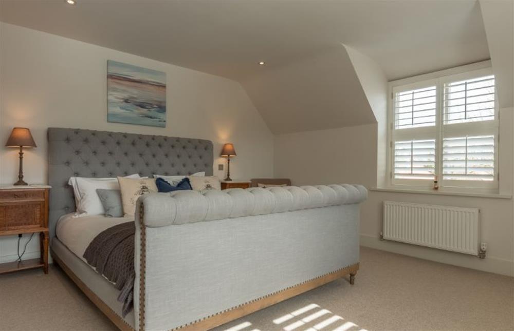 First floor: The master bedroom has king-size bed at Number One, Burnham Market near Kings Lynn