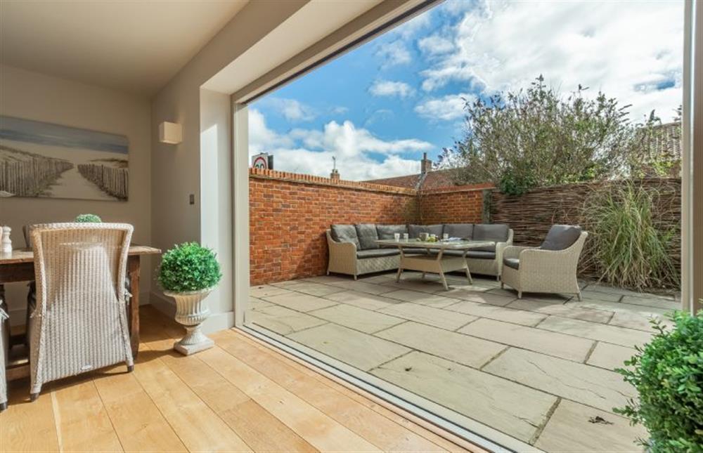 Ground floor: Bi-fold doors open out to the enclosed garden at Number One, Burnham Market near Kings Lynn