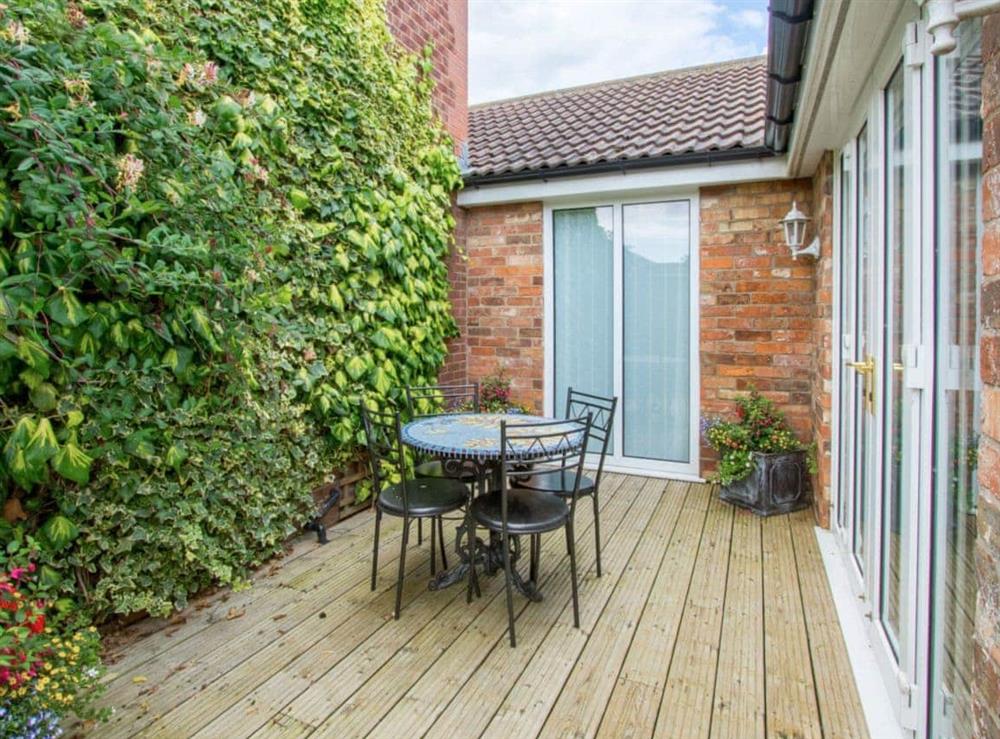 Decked patio to rear of holiday home at Nursery Cottage in North Somercotes, near Louth, Lincolnshire