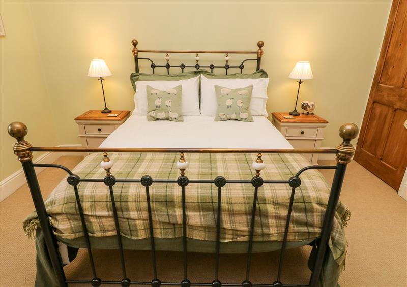 A bedroom in Nutkin Cottage at Nutkin Cottage, Bowness-On-Windermere