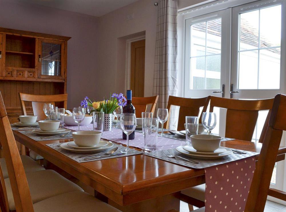 Dining room at Nyetimber Cottage in Pagham, near Bognor Regis, West Sussex